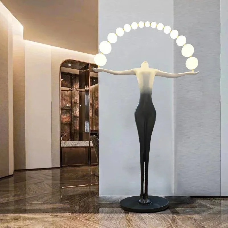 Humanoid Sculpture Holding Ball Floor Lamp